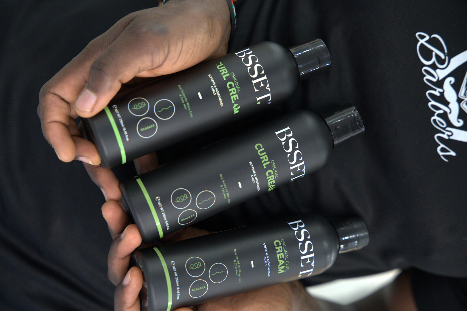 BSSET styling products held in hand