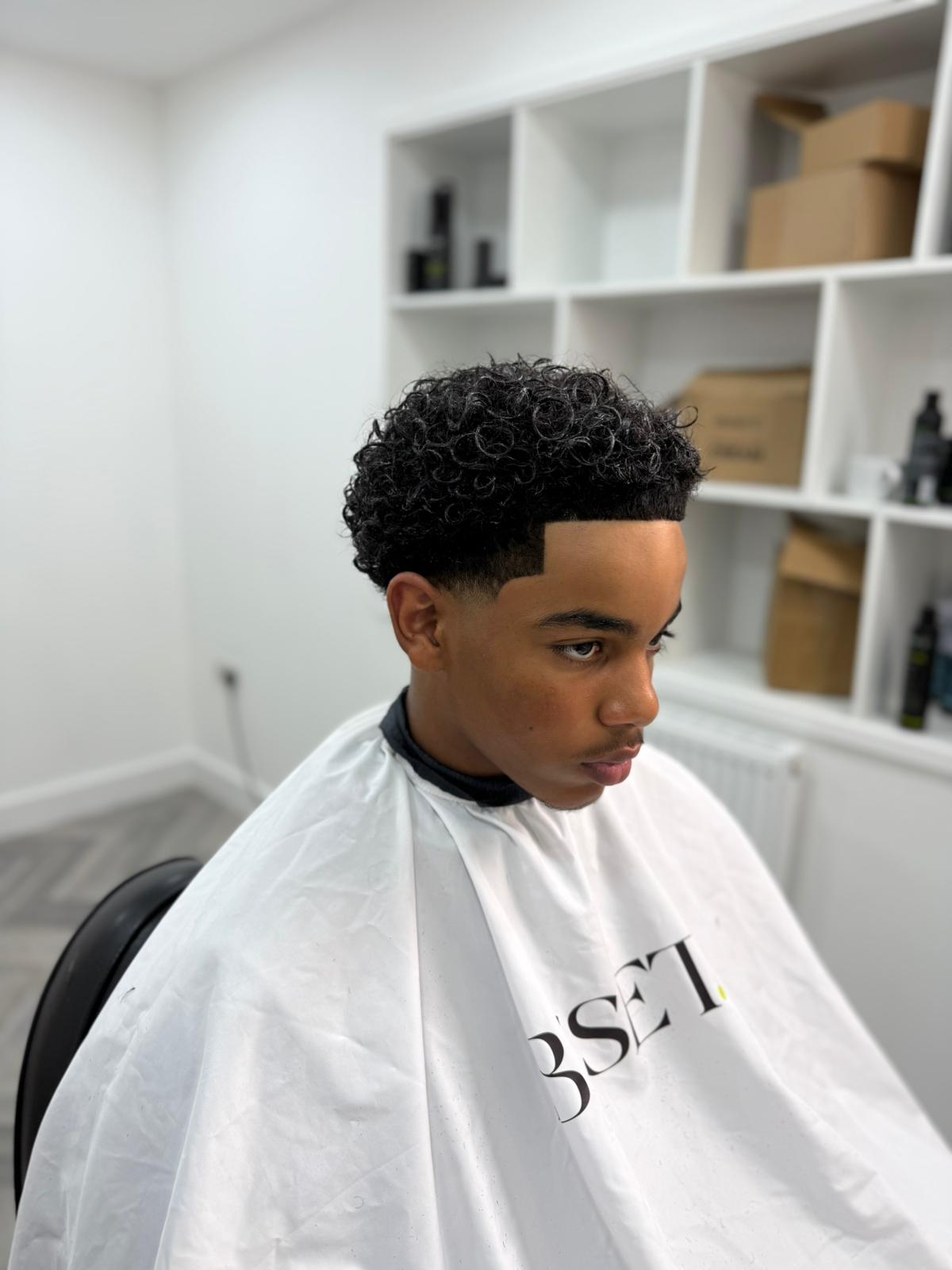 Curly top with a crisp line up