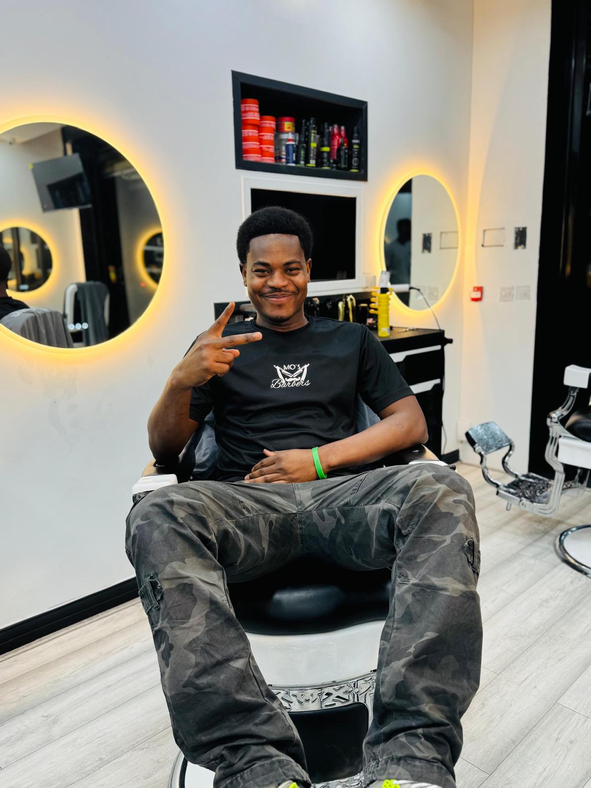 Anas, Barber at Mo's Barbers